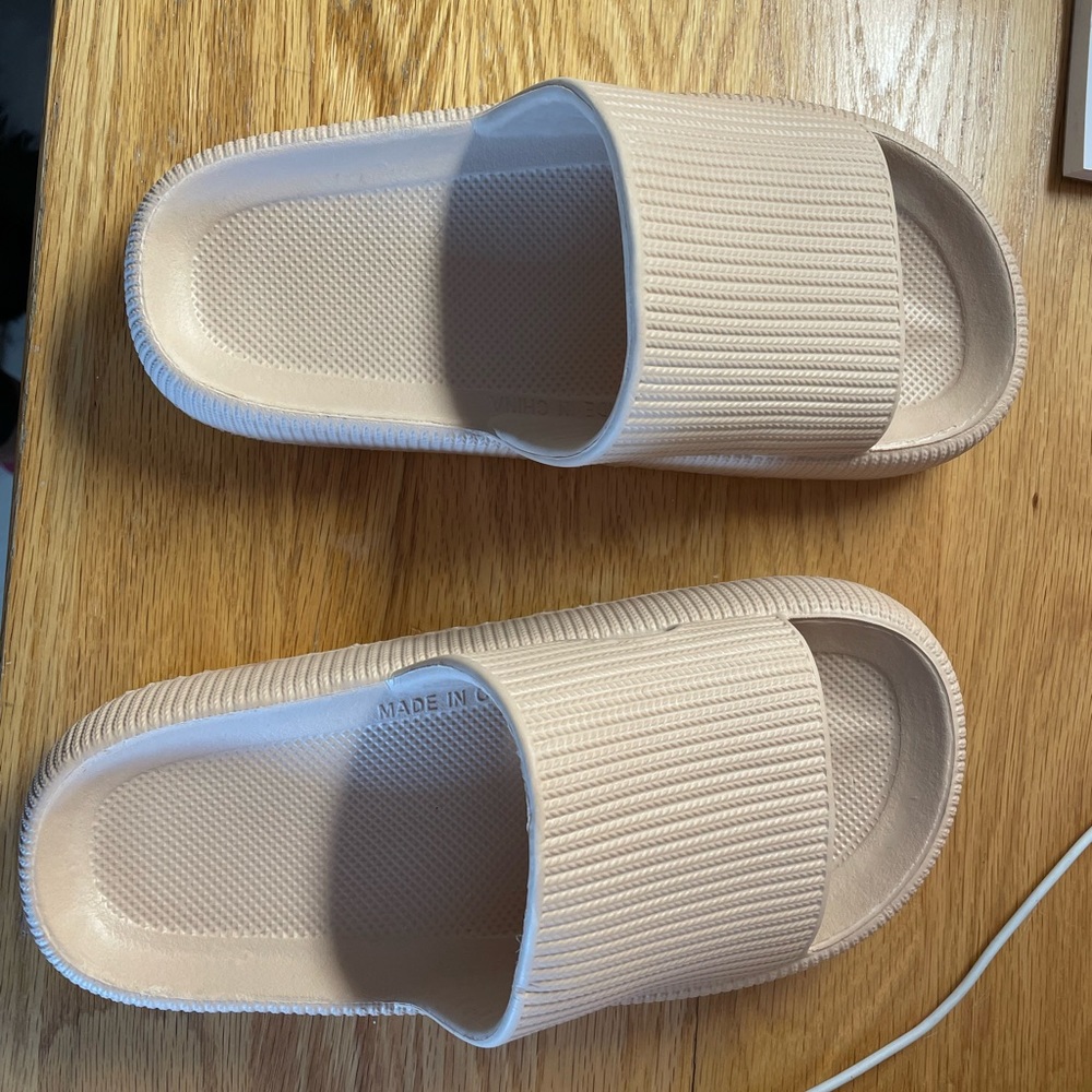 Rubber slides, never worn